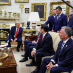 U.S. President Donald Trump speaks towards U.S. Vice President JD Vance and Secretary of State Marco Rubio during a meeting with Ukrainian President Volodymyr Zelenskiy at the Oval Office of the White House, amid negotiations to end the Russian war in Ukraine, in Washington, D.C., U.S., August 18, 2025. REUTERS/Kevin Lamarque