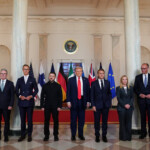 U.S. President Donald Trump, Ukrainian President Volodymyr Zelenskiy, German Chancellor Friedrich Merz, French President Emmanuel Macron, British Prime Minister Keir Starmer, Italian Prime Minister Giorgia Meloni, and Finland's President Alexander Stubb, NATO Secretary General Mark Rutte and European Commission President Ursula von der Leyen pose for a family photo amid negotiations to end the Russian war in Ukraine, at the White House in Washington, D.C., U.S., August 18, 2025. REUTERS/Alexander Drago