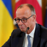 German Chancellor Friedrich Merz attends a meeting with U.S. President Donald Trump, Ukrainian President Volodymyr Zelenskiy and other European leaders amid negotiations to end the Russian war in Ukraine, at the White House in Washington, D.C., U.S., August 18, 2025. REUTERS/Al Drago