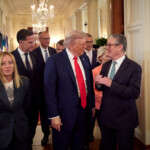 U.S. President Donald Trump talks with British Prime Minister Keir Starmer next to French President Emmanuel Macron, Italian Prime Minister Giorgia Meloni, European Commission President Ursula von der Leyen, NATO Secretary General Mark Rutte, Finland's President Alexander Stubb and German Chancellor Friedrich Merz as they walk during a meeting, amid negotiations to end the Russian war in Ukraine with Ukrainian President Volodymyr Zelenskiy (not pictured), at the White House in Washington, D.C., U.S., August 18, 2025. Ukrainian Presidential Press Service/Handout via REUTERS