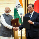 India's Prime Minister Narendra Modi and Japan's Prime Minister Shigeru Ishiba shake hands during a joint press conference in Tokyo, Japan August 29, 2025. Takashi Aoyama/Pool via REUTERS