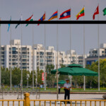 A security guard looks on next to the Meijiang Convention and Exhibition Center, a venue for 2025 Shanghai Cooperation Organisation (SCO) summit in Tianjin, China August 31, 2025. REUTERS/Maxim Shemetov