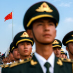 Chinese guards of honour take part in a ceremony to welcome Russian President Vladimir Putin, who arrives at an airport to attend the Shanghai Cooperation Organisation (SCO) summit in Tianjin, China August 31, 2025. Sputnik/Vladimir Smirnov/Pool via REUTERS ATTENTION EDITORS - THIS IMAGE WAS PROVIDED BY A THIRD PARTY.