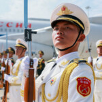 Chinese guards of honour take part in a ceremony to welcome Russian President Vladimir Putin, who arrives at an airport to attend the Shanghai Cooperation Organisation (SCO) summit in Tianjin, China August 31, 2025. Sputnik/Vladimir Smirnov/Pool via REUTERS ATTENTION EDITORS - THIS IMAGE WAS PROVIDED BY A THIRD PARTY.