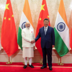 Prime Minister Narendra Modi shakes hands with Chinese President Xi Jinping during a meeting on the sidelines of Shanghai Cooperation Organisation (SCO) Summit in Tianjin, China, August 31, 2025. India's Press Information Bureau/Handout via REUTERS