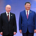 Chinese President Xi Jinping welcomes Russian President Vladimir Putin during a ceremony at the Shanghai Cooperation Organisation (SCO) summit in Tianjin, China August 31, 2025. Sputnik/Sergei Bobylyov/Pool via REUTERS ATTENTION EDITORS - THIS IMAGE WAS PROVIDED BY A THIRD PARTY.