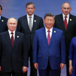 Leaders and officials, including Chinese President Xi Jinping and Russian President Vladimir Putin, attend a photo ceremony at the Shanghai Cooperation Organisation (SCO) summit in Tianjin, China August 31, 2025. Sputnik/Alexander Kazakov/Pool via REUTERS ATTENTION EDITORS - THIS IMAGE WAS PROVIDED BY A THIRD PARTY.