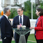 British Prime Minister Keir Starmer speaks to British Deputy High Commissioner for Western India Harjinder Kang and British High Commissioner to India, Lindy Cameron, on a rooftop in front of the Gateway of India on October 8, 2025 in Mumbai, India. Leon Neal/Pool via REUTERS