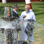 MUMBAI, INDIA - OCTOBER 9: British Prime Minister Sir Keir Starmer and Indian Prime Minister Narendra Modi interact at Raj Bhavan on October 9, 2025 in Mumbai, India. Leon Neal/Pool via REUTERS