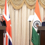 British Prime Minister Sir Keir Starmer and the Prime Minister of India, Narendra Modi, deliver a statement to the press at Raj Bhavan, in Mumbai, India October 9, 2025. Stefan Rousseau/Pool via REUTERS