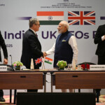 MUMBAI, INDIA - OCTOBER 9: British Prime Minister Keir Starmer and Prime Minister of India Narendra Modi attend the India-UK CEO Forum at Jio World Convention Centre on October 9, 2025 in Mumbai, India. Leon Neal/Pool via REUTERS