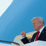 U.S. President Donald Trump gestures as he disembarks Air Force One at Ben Gurion International Airport, amid a U.S.-brokered prisoner-hostage swap and ceasefire deal between Israel and Hamas, in Lod, Israel, October 13, 2025. REUTERS/Evelyn Hockstein