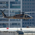 A helicopter, carrying released hostages who were kidnapped during the deadly October 7, 2023 attack by Hamas and taken to Gaza, amid a ceasefire between Israel and Hamas in Gaza, arrives at Sourasky Medical Center (Ichilov) in Tel Aviv, Israel October 13, 2025. REUTERS/Ronen Zvulun