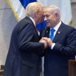 President Donald Trump talks with Israel's Prime Minister Benjamin Netanyahu at the Knesset, Monday, Oct. 13, 2025, in Jerusalem. Evan Vucci/Pool via REUTERS TPX IMAGES OF THE DAY