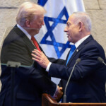 U.S. President Donald Trump and Israeli Prime Minister Benjamin Netanyahu shake hands at the Knesset on the day Trump addresses it, amid a U.S.-brokered prisoner-hostage swap and ceasefire deal between Israel and Hamas, in Jerusalem, October 13, 2025. REUTERS/Evelyn Hockstein/Pool