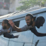 Freed Palestinian prisoners gesture from a bus after they were released by Israel as part of a hostages-prisoners swap and a ceasefire deal between Hamas and Israel, in Khan Younis in the southern Gaza Strip, October 13, 2025. REUTERS/Mahmoud Issa