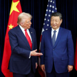 U.S. President Donald Trump and Chinese President Xi Jinping talk as they hold a bilateral meeting at Gimhae International Airport, on the sidelines of the Asia-Pacific Economic Cooperation (APEC) summit, in Busan, South Korea, October 30, 2025. REUTERS/Evelyn Hockstein