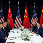 U.S. President Donald Trump, accompanied by U.S. Secretary of State Marco Rubio, and U.S. Secretary of Commerce Howard Lutnick, attends a bilateral meeting with Chinese President Xi Jinping, accompanied by Chinese Foreign Minister Wang Yi, at Gimhae International Airport, on the sidelines of the Asia-Pacific Economic Cooperation (APEC) summit, in Busan, South Korea, October 30, 2025. REUTERS/Evelyn Hockstein