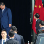U.S. President Donald Trump and Chinese President Xi Jinping talk as they leave after a bilateral meeting at Gimhae International Airport, on the sidelines of the Asia-Pacific Economic Cooperation (APEC) summit, in Busan, South Korea, October 30, 2025. REUTERS/Evelyn Hockstein