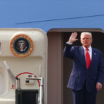 U.S. President Donald Trump gestures as he boards Air Force One at Gimhae International Airport in Busan, South Korea, October 30, 2025. REUTERS/Evelyn Hockstein