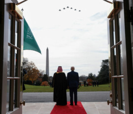 U.S. President Donald Trump and Saudi Crown Prince and Prime Minister Mohammed bin Salman watch a military flyover at the White House in Washington, D.C., U.S., November 18, 2025. REUTERS/Evelyn Hockstein