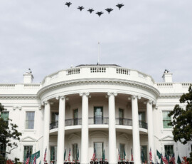 U.S. President Donald Trump and Saudi Crown Prince and Prime Minister Mohammed bin Salman watch a military flyover at the White House in Washington, D.C., U.S., November 18, 2025. REUTERS/Kevin Lamarque
