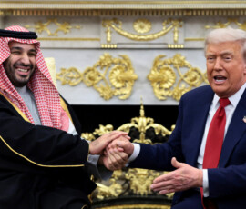 Saudi Crown Prince and Prime Minister Mohammed bin Salman laughs as U.S. President Donald Trump speaks while shaking hands during a meeting in the Oval Office at the White House in Washington, D.C., U.S., November 18, 2025. REUTERS/Evelyn Hockstein