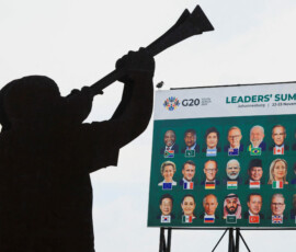 A billboard of G20 world leaders near a sculpture outside the Nasrec Expo centre ahead of the G20 Summit, in Johannesburg, South Africa, November 20, 2025. REUTERS/Esa Alexander