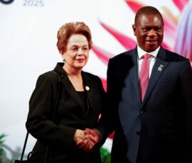 South African Deputy President Paul Mashatile welcomes former Brazilian president Dilma Rousseff on the opening day of the G20 Summit at the Nasrec Expo Centre in Johannesburg, South Africa, November 22, 2025. REUTERS/Thomas Mukoya/Pool