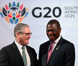 British Prime Minister Keir Starmer is greeted by Deputy President of South Africa Paul Mashatile as he arrives at the G20 Summit on November 22, 2025 in Johannesburg, South Africa. Leon Neal/Pool via REUTERS