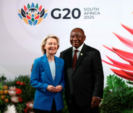 European Commission President Ursula von der Leyen poses with South Africa's President Cyril Ramaphosa, on the first day of the G20 Summit at the Nasrec Expo Centre in Johannesburg, South Africa, November 22, 2025. REUTERS/Yves Herman