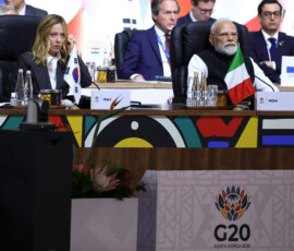 Italy's Prime Minister Giorgia Meloni and India's Prime Minister Narendra Modi attend a plenary session on the first day of the G20 Leaders' Summit at the Nasrec Expo Centre in Johannesburg, South Africa, November 22, 2025. REUTERS/Yves Herman