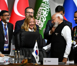 Italian Prime Minister Giorgia Meloni speaks with Indian Prime Minister Narendra Modi during the opening plenary session at the G20 Summit on November 22, 2025 in Johannesburg, South Africa ahead of the G20 Summit. Leon Neal/Pool via REUTERS