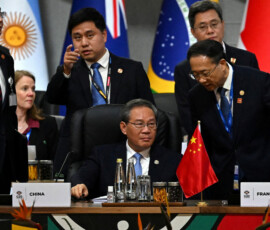 China's Prime Minister Li Qiang attends the opening plenary session at the G20 Summit on November 22, 2025 in Johannesburg, South Africa, Leon Neal/Pool via REUTERS