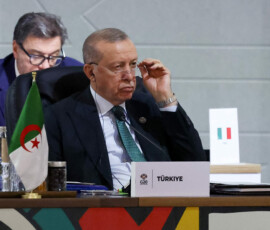 Turkey's President Tayyip Erdogan attends a plenary session on the first day of the G20 Leaders' Summit at the Nasrec Expo Centre in Johannesburg, South Africa, November 22, 2025. REUTERS/Yves Herman