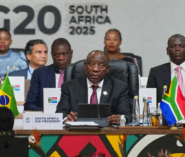 South African President Cyril Ramaphosa addresses the opening session of the G20 leaders' summit in Johannesburg, South Africa, November 22, 2025. Misper Apawu/Pool via REUTERS
