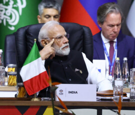 India's Prime Minister Narendra Modi attends a plenary session on the first day of the G20 Leaders' Summit at the Nasrec Expo Centre in Johannesburg, South Africa, November 22, 2025. REUTERS/Yves Herman