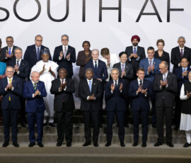 Leaders and delegates stand for a family photo on the first day of the G20 Leaders' Summit at the Nasrec Expo Centre in Johannesburg, South Africa, November 22, 2025. REUTERS/Yves Herman/Pool