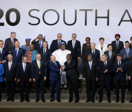 Leaders and delegates stand for a family photo on the first day of the G20 Leaders' Summit at the Nasrec Expo Centre in Johannesburg, South Africa, November 22, 2025. REUTERS/Yves Herman/Pool