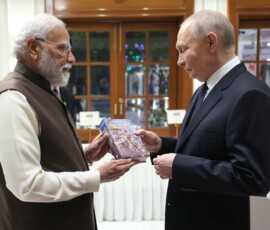 PM Narendra Modi Presented a copy of the Gita in Russian to President of Russia Vladimir Putin