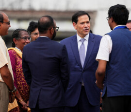 U.S. Secretary of State Marco Rubio speaks to Indian officials before boarding his plane to New Delhi at Netaji Subhash Chandra Bose International Airport in Kolkata, India, Saturday, May 23, 2026. Julia Demaree Nikhinson/Pool via REUTERS