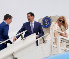 U.S. Secretary of State Marco Rubio gestures to the U.S. Ambassador to India Sergio Gor, as they board their plane for New Delhi at Netaji Subhash Chandra Bose International Airport in Kolkata, India, Saturday, May 23, 2026. Julia Demaree Nikhinson/Pool via REUTERS