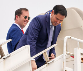 U.S. Secretary of State Marco Rubio and the U.S. Ambassador to India Sergio Gor, board their plane for New Delhi at Netaji Subhash Chandra Bose International Airport in Kolkata, India, Saturday, May 23, 2026. Julia Demaree Nikhinson/Pool via REUTERS
