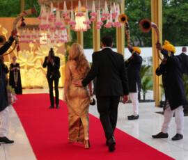 United States Secretary of State Marco Rubio and his wife Jeanette walk a red carpet before attending a reception at Roosevelt House, in New Delhi, India, Saturday, May 23, 2026. Julia Demaree Nikhinson/Pool via REUTERS