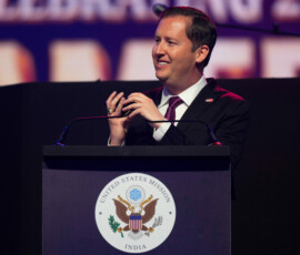 U.S. Ambassador to India Sergio Gor speaks to U.S. President Donald Trump on the phone at an event celebrating the United States' 250th anniversary, at the Bharat Mandapam convention center, in New Delhi, India, Sunday, May 24, 2026. Julia Demaree Nikhinson/Pool via REUTERS