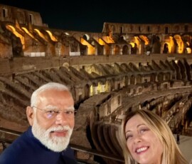 Italian PM Giorgia Meloni poses for a selfie with PM Modi at the Colosseum in Italy.