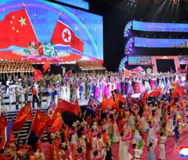 The flags of North Korea and China are waved on stage during a performance at the Pyongyang Indoor Stadium, during Chinese President Xi Jinping's state visit, in Pyongyang, North Korea, June 8, 2026, in this picture released by North Korea's official Korean Central News Agency. KCNA via REUTERS