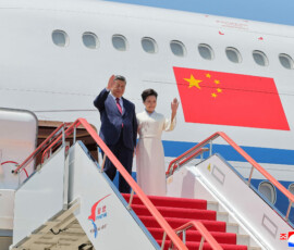 Chinese President Xi Jinping and his wife first lady Peng Liyuan disembark at Pyongyang Airport during Xi's state visit to Pyongyang, North Korea, in this picture taken June 8, 2026 and released June 9, 2026. KCNA via REUTERS ATTENTION EDITORS - THIS IMAGE WAS PROVIDED BY A THIRD PARTY. REUTERS IS UNABLE TO INDEPENDENTLY VERIFY THIS IMAGE. NO THIRD PARTY SALES. SOUTH KOREA OUT. NO COMMERCIAL OR EDITORIAL SALES IN SOUTH KOREA.
