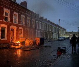 A car burns in east Belfast, during a protest after a knife attack on June 8 left a man seriously injured and prompted police to declare a critical incident, in Belfast, Northern Ireland, June 9, 2026. Picture taken wih a phone. REUTERS/Isabel Infantes TPX IMAGES OF THE DAY