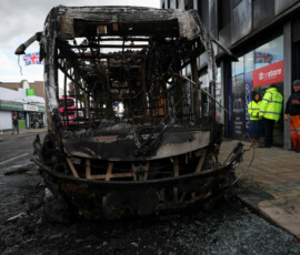 Remains of a burnt bus stand on the Newtownards Road in the aftermath of anti-immigrant protests following a knife attack on June 8, which left a man seriously injured and prompted police to declare a critical incident, Belfast, Northern Ireland, June 10, 2026. REUTERS/Isabel Infantes TPX IMAGES OF THE DAY